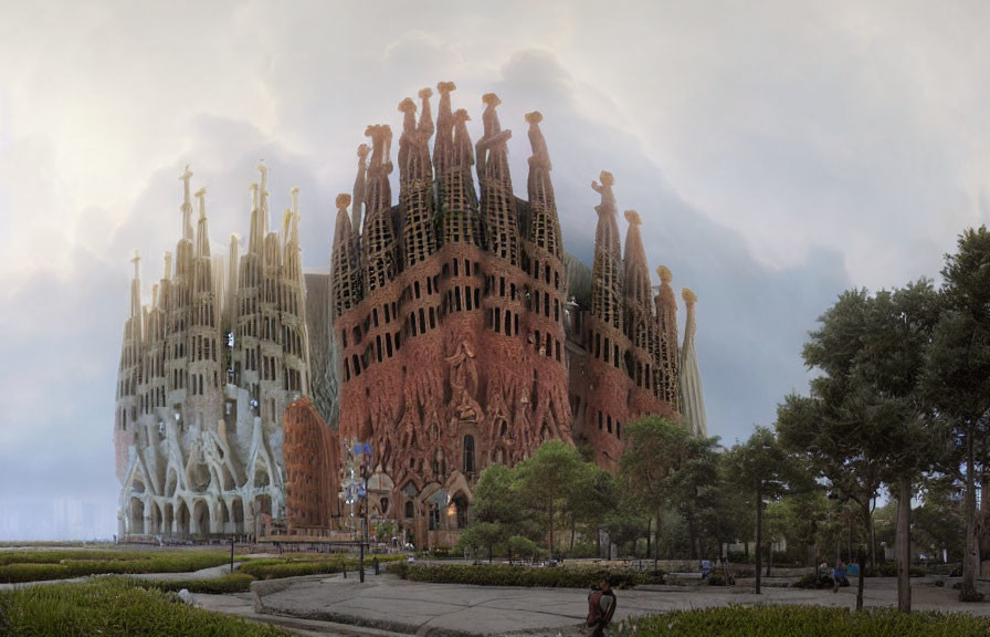 Panoramic view of Sagrada Família facades and spires against cloudy sky