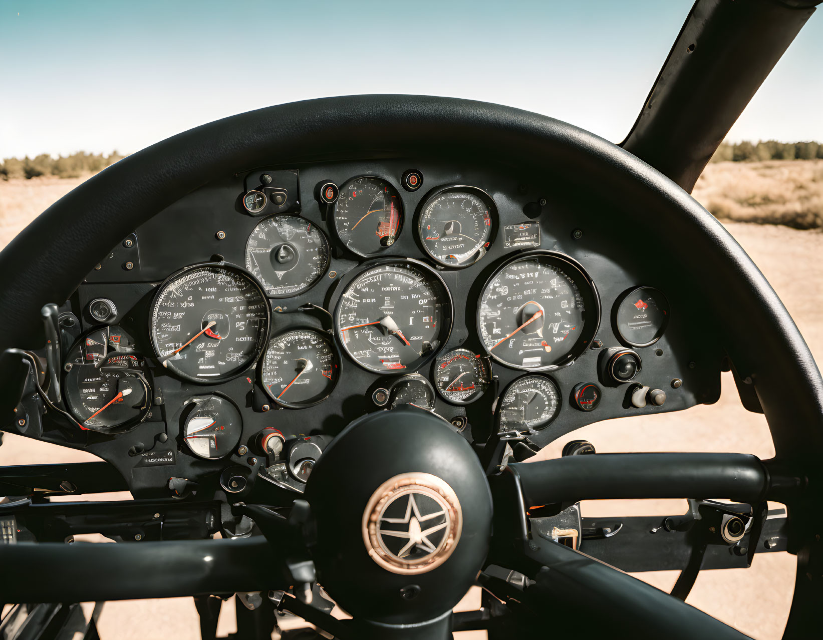 Aircraft cockpit with analog instruments: altimeter, speedometer, compass