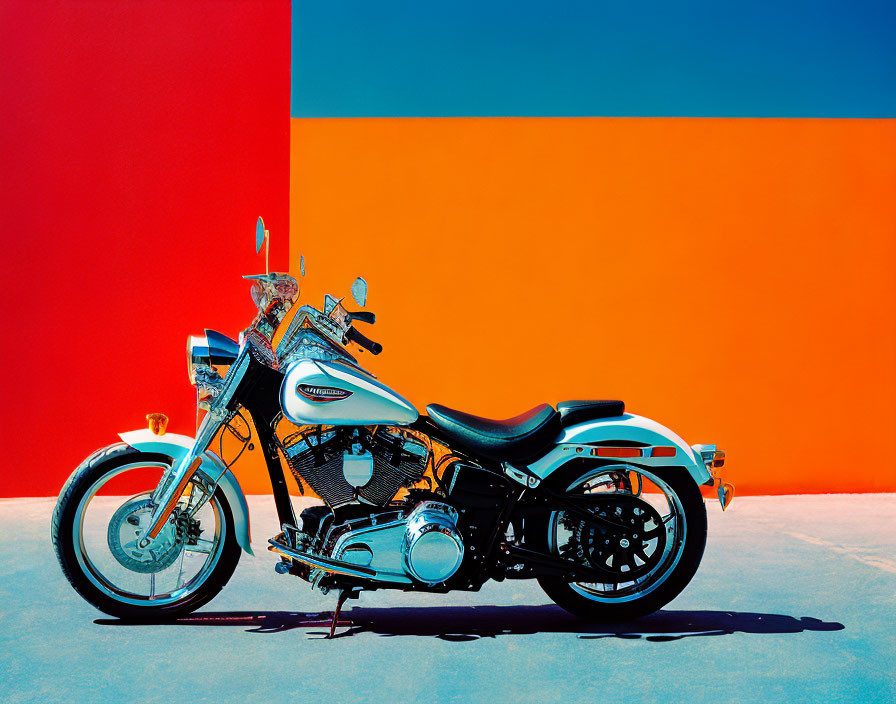 Vintage Motorcycle Against Vibrant Red and Blue Background