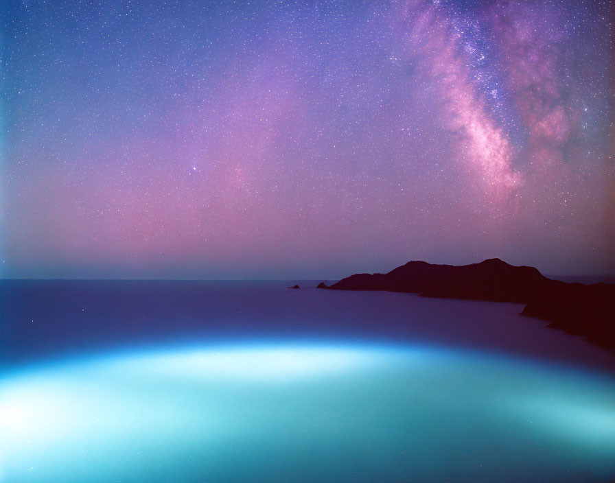 Starry nightscape with Milky Way over tranquil sea