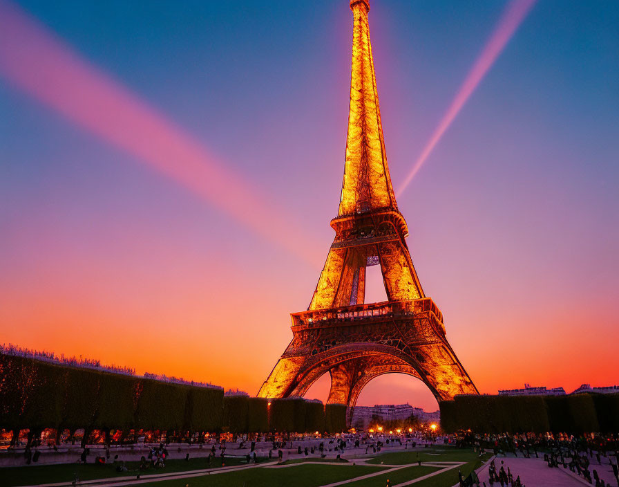 Iconic Eiffel Tower at Dusk with Orange and Pink Sky