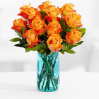 Orange Roses Bouquet in Blue Glass Jar on White Background