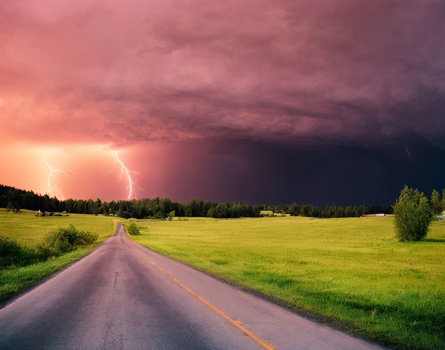 Dramatic thunderstorm approaching green fields