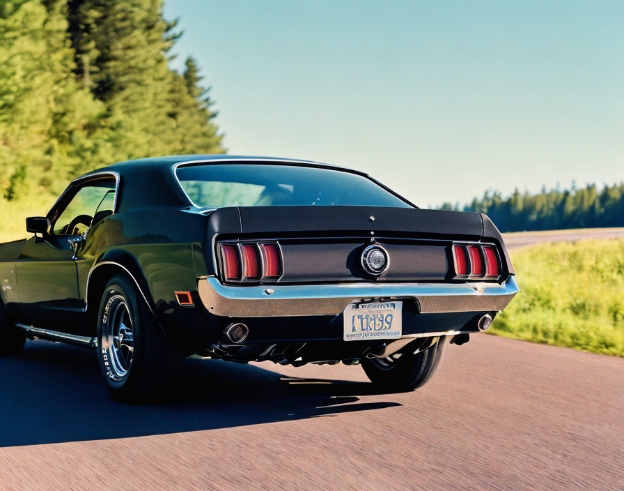 Classic Ford Mustang with Triple-Bar Taillights Driving on Highway