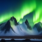 Northern Lights illuminating snow-capped mountains at night