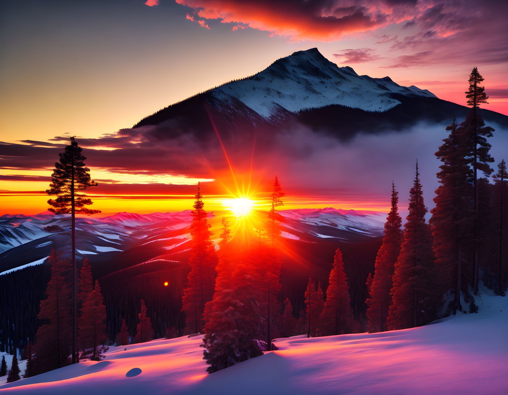 Snow-covered mountain sunset with sunbeams and vibrant sky gradient