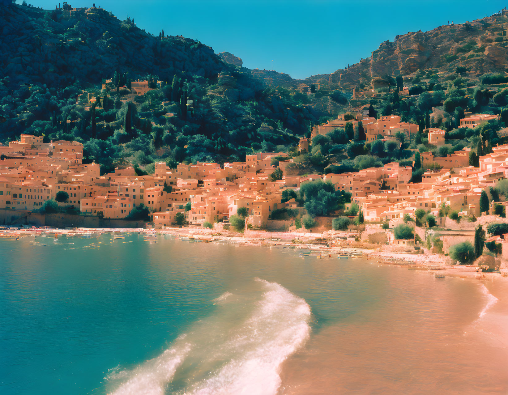 Tranquil Coastal Village with Terracotta-Roofed Houses