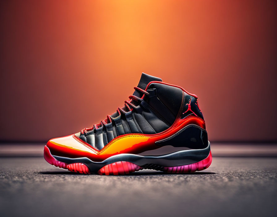 Black and Red Basketball Shoe with Glossy Finish on Orange Gradient Background