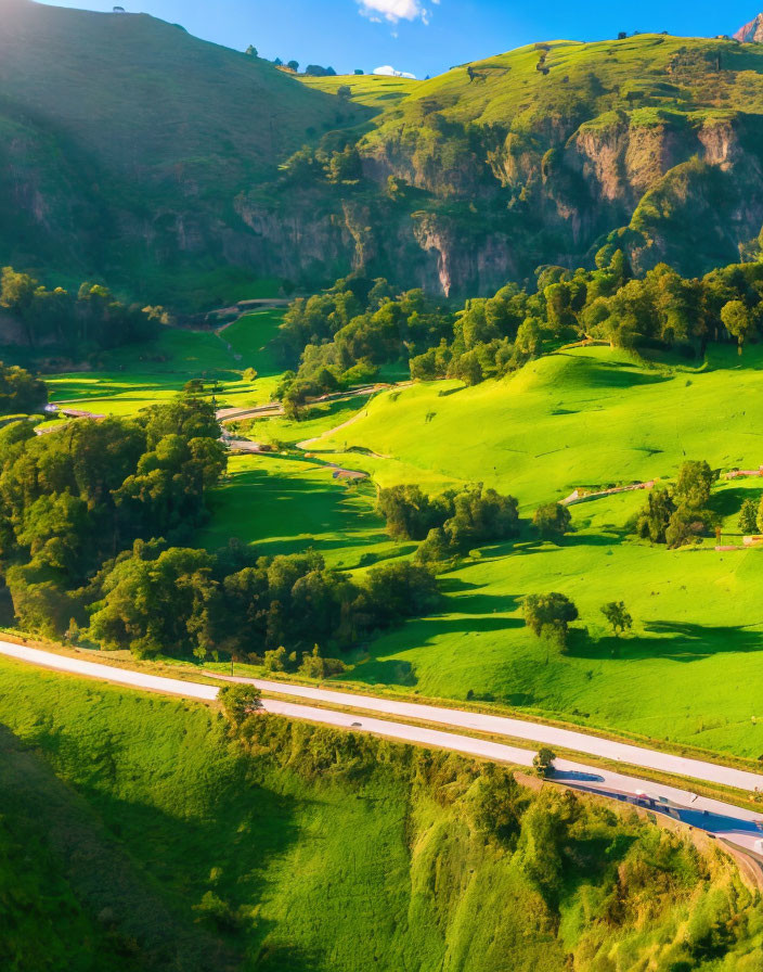 Scenic aerial view of winding road in lush green hills