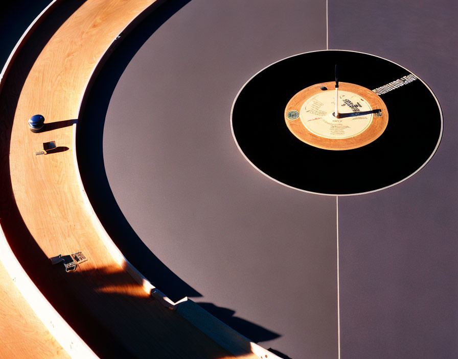 Vinyl record on turntable with arm and needle, warm lighting.