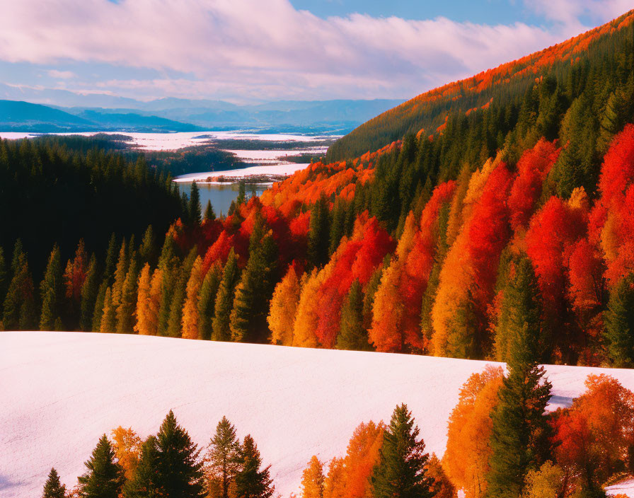 Colorful autumn trees with snowy foreground, lake, and mountains.