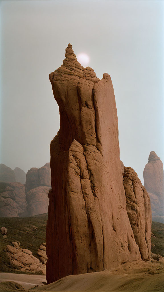 Sandstone Rock Formation Silhouetted Against Clear Sky