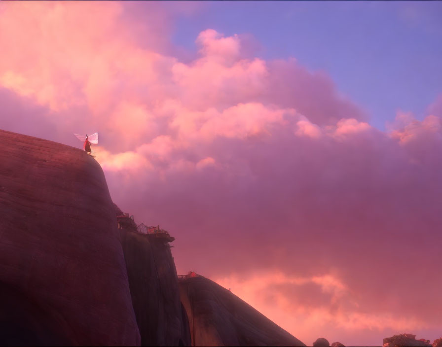 Person on Cliff Gazes at Pink Clouds and Sunlit Landscape