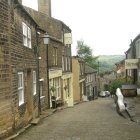 Idyllic Village Scene with Cottages at Sunset