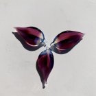 Purple 3D Petals Forming Butterfly Shape on Light Background