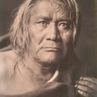 Elderly Native American Portrait with Headdress and Jewelry