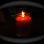 Contemplative Woman with Candle in Ethereal Setting