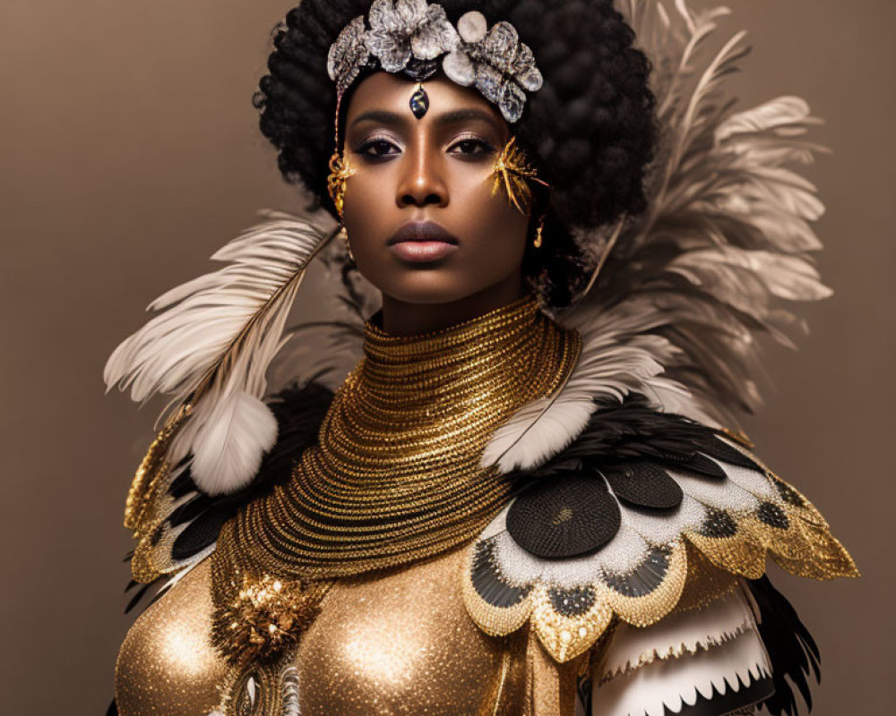 Elegant woman in golden costume with feathers and jewelry