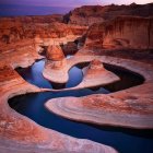 Colorful Striped Rock Formations in Surreal Landscape