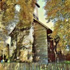 Rustic wooden church in autumn painting with vintage vibe