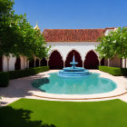 Tranquil courtyard with arches, lush garden, fountain under clear blue sky