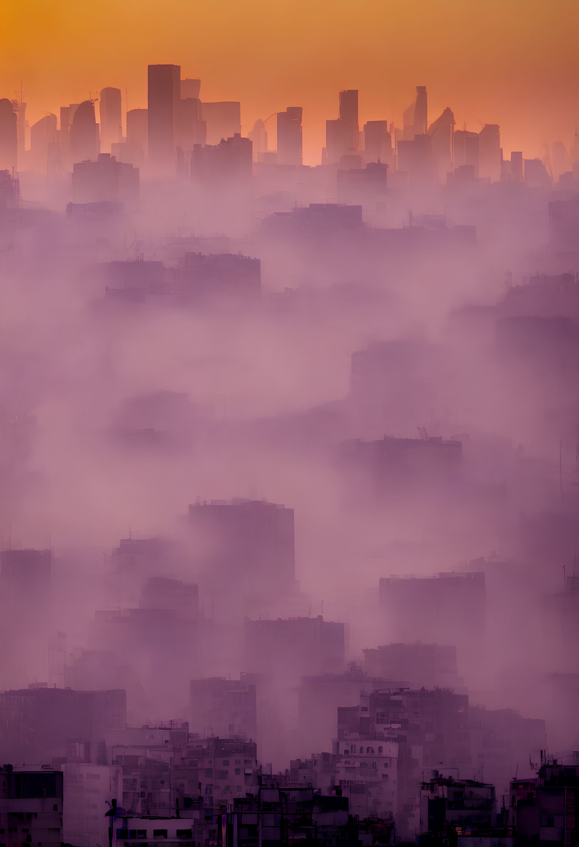 Cityscape with buildings silhouetted in orange haze.