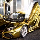 Detailed Gold and Silver Steampunk Car with Exposed Gears on Starry Background