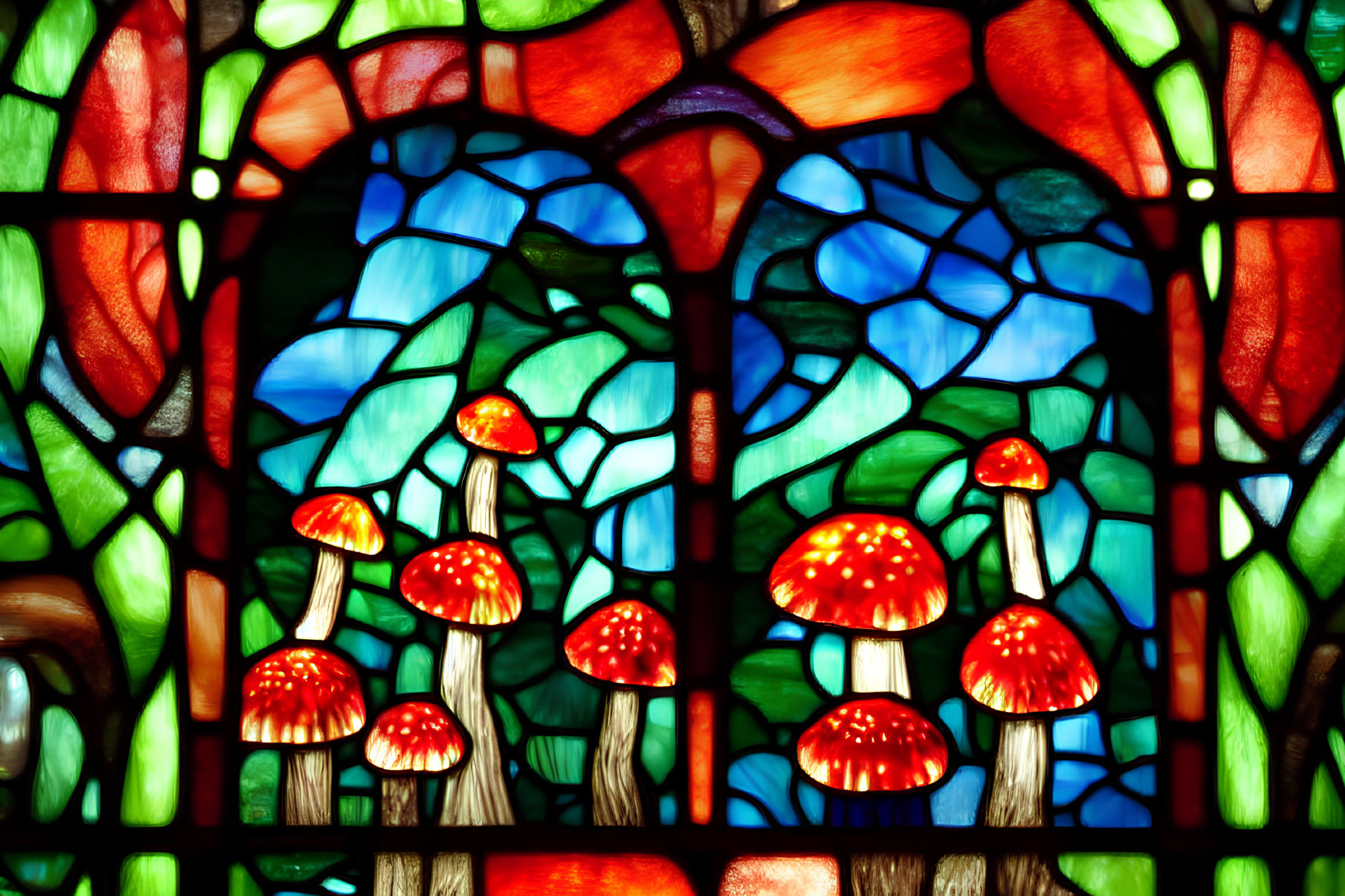 Vibrant stained glass window with red-capped mushrooms in green foliage