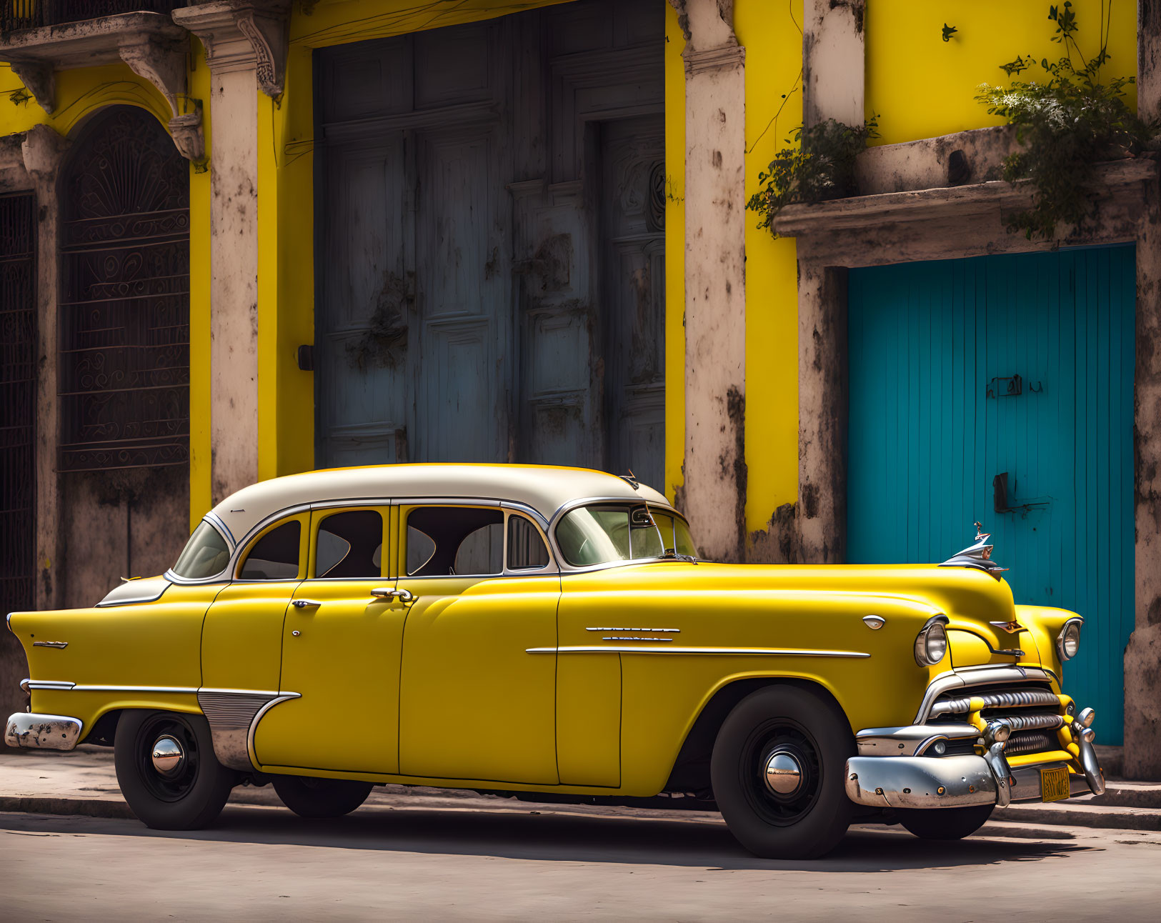 Vintage Yellow Car Parked in Front of Building with Yellow Walls and Blue Door