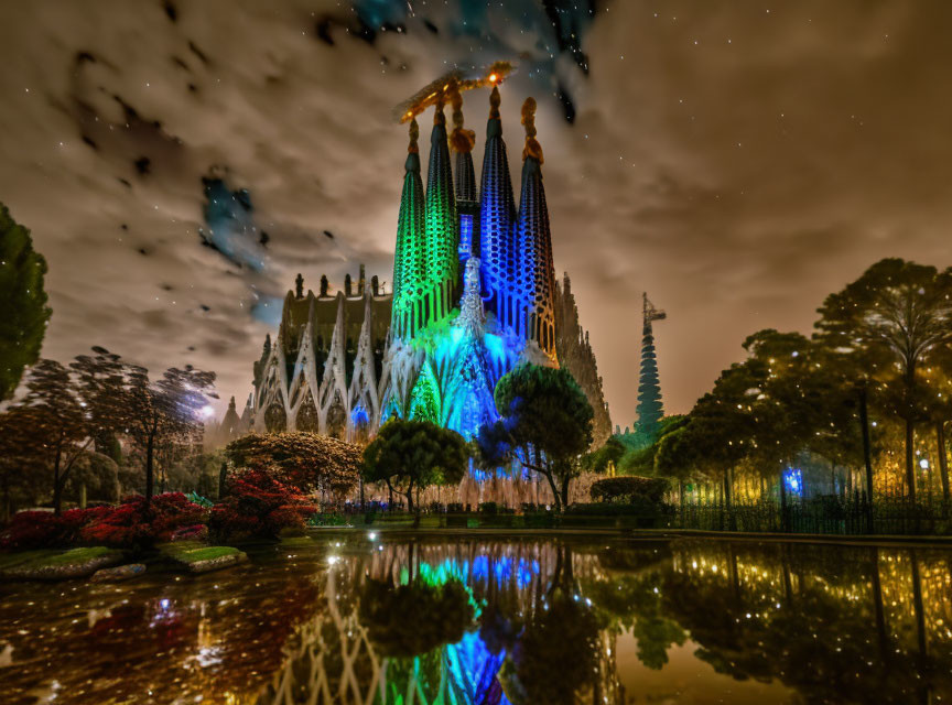 Sagrada Família night view with colorful lights and starry sky