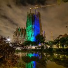 Sagrada Família night view with colorful lights and starry sky