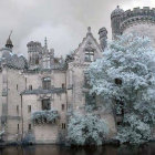 Snowy Twilight Scene: White Castle, Frozen Trees, Tranquil River