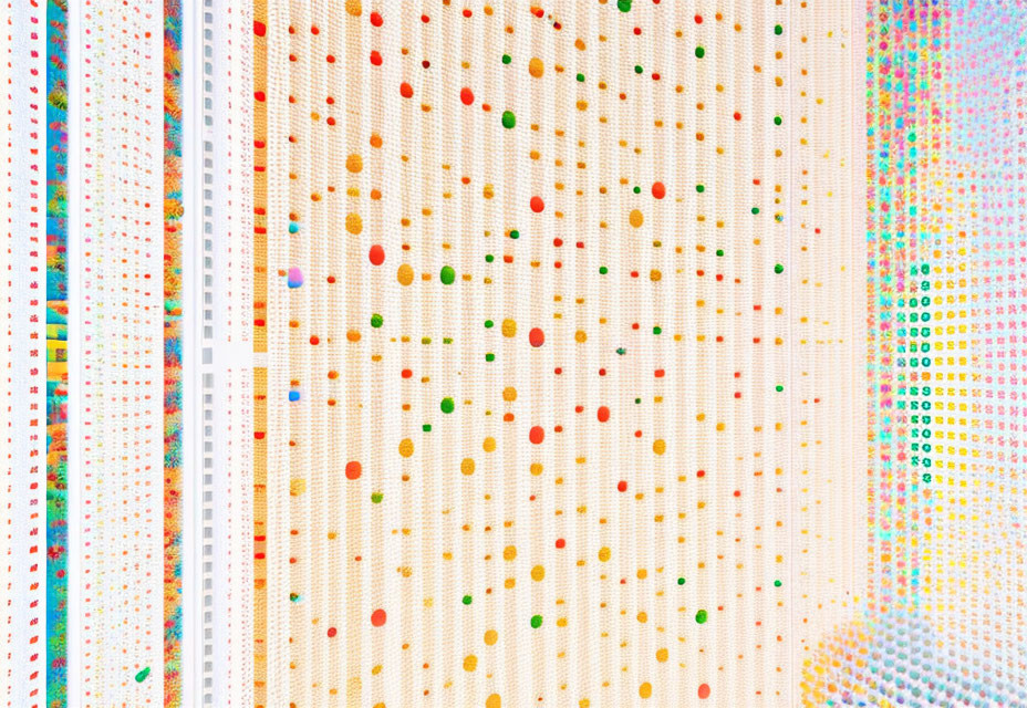 Vibrant Grid Pattern of Colorful Dots on White Background