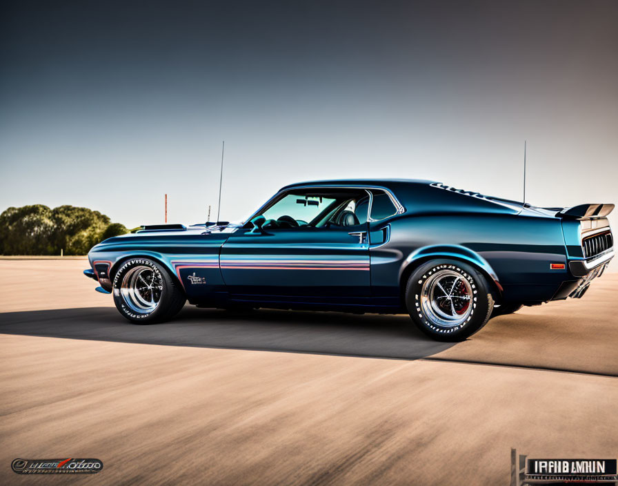 Blue Muscle Car with Racing Stripes and Chrome Wheels in Motion at Sunset