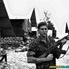 Soldier in Tactical Gear with Rifle in Surreal Seascape