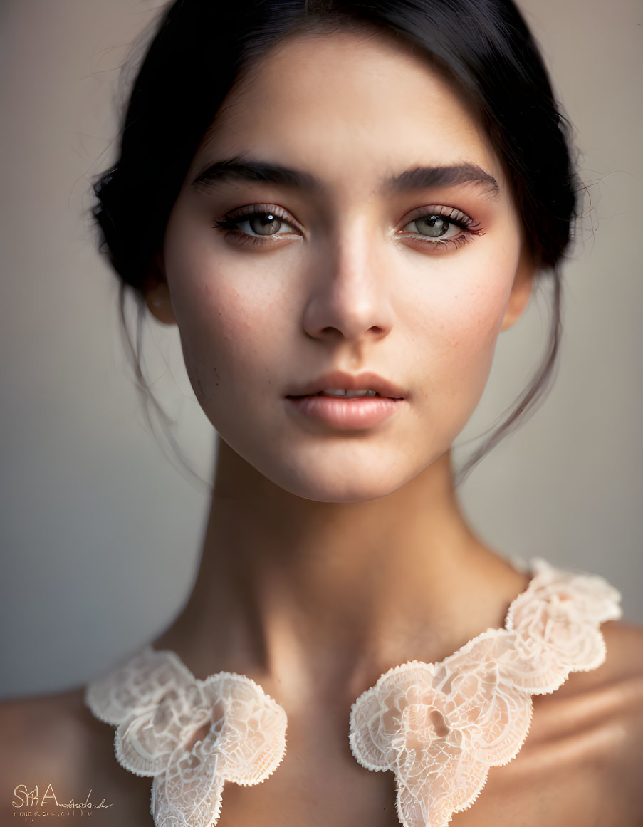 Portrait of Woman with Dark Hair and Olive Skin in Lace Garment