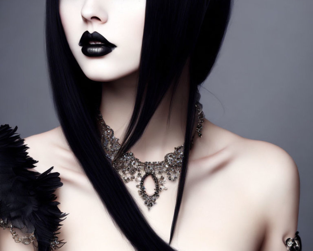 Dark makeup, black lipstick, straight hair, feathered accessory, ornate necklace