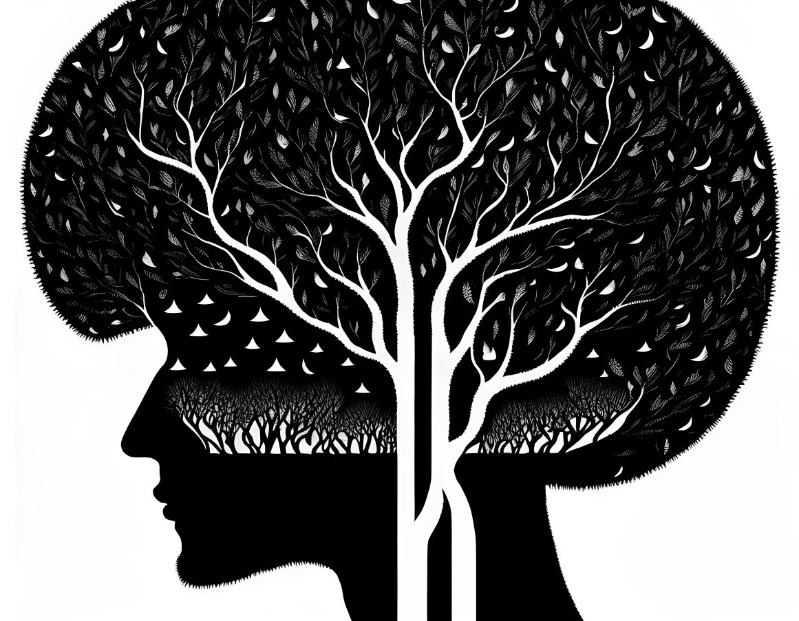 Profile silhouette with tree symbolizing growth and knowledge