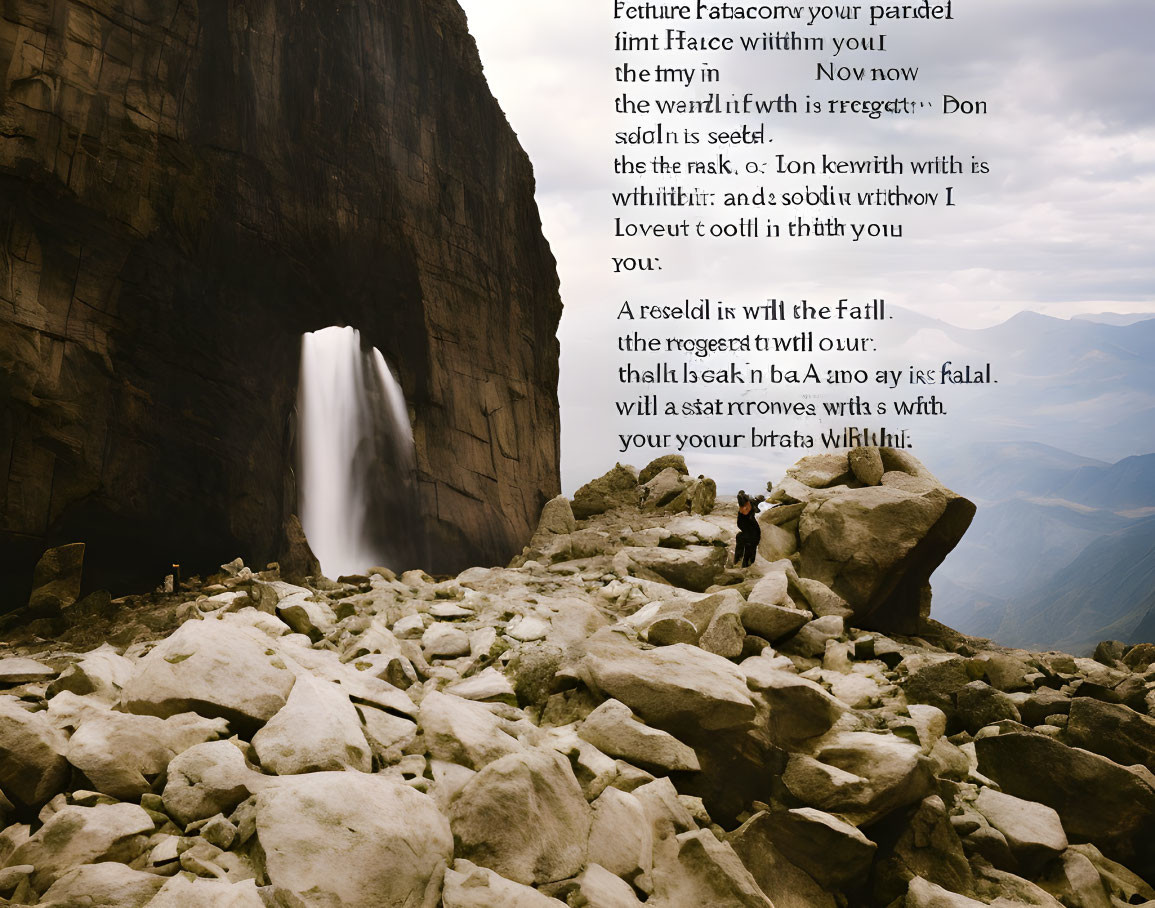 Person admiring waterfall in rocky terrain