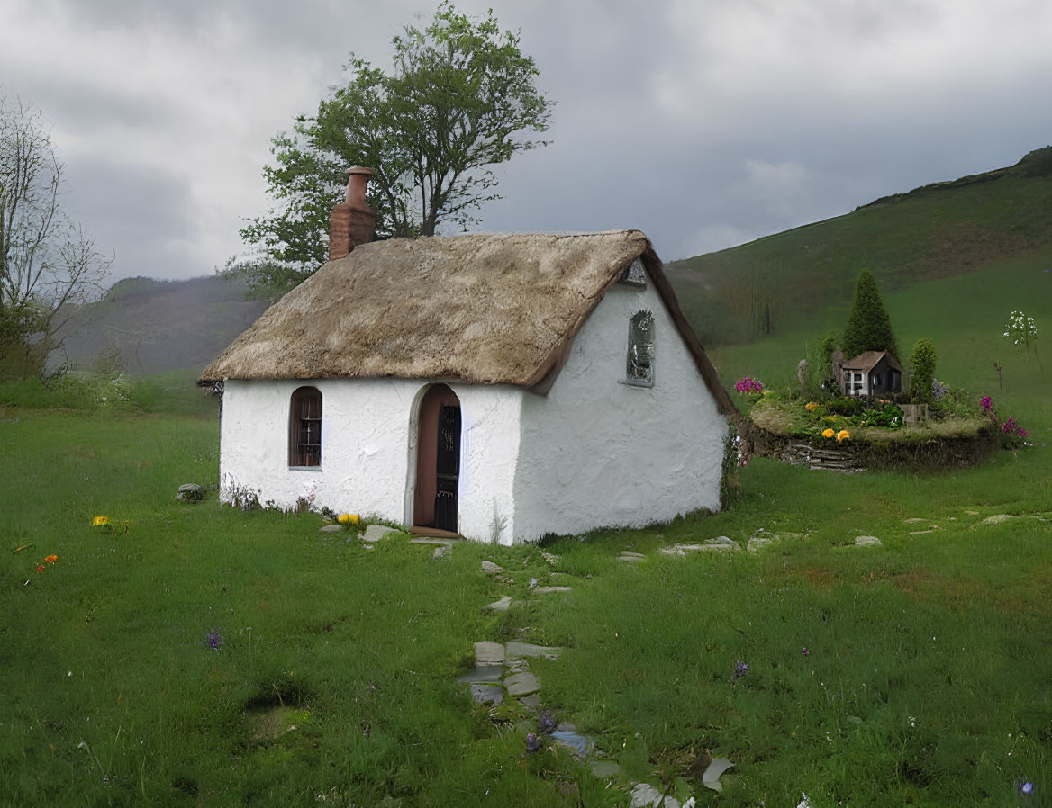 White Thatched-Roof Cottage Surrounded by Green Hills