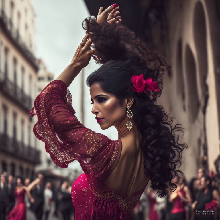 Woman in red flamenco dress dances passionately on street with blurry spectators