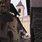 Dark Alley Scene with Fog and European Buildings