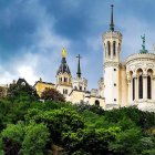 Watercolor illustration of grand cathedral on flower-speckled hill