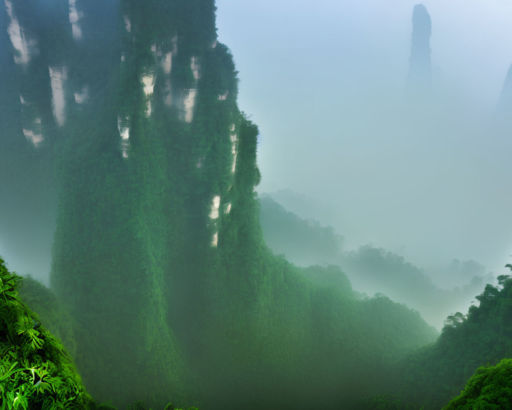 Misty green mountains with dense foliage and hazy sky