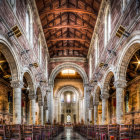 Colorful, ornate interior with intricate columns and glowing pathway