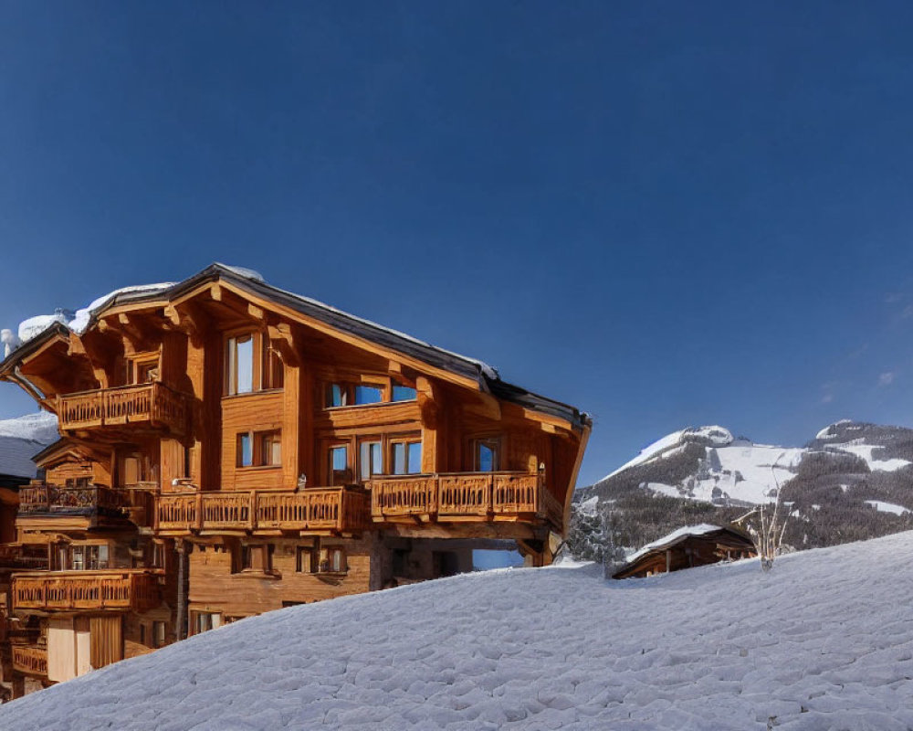 Snow-covered traditional wooden chalet in wintry landscape