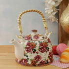 Porcelain Teapot with Gold Accents and Floral Pattern