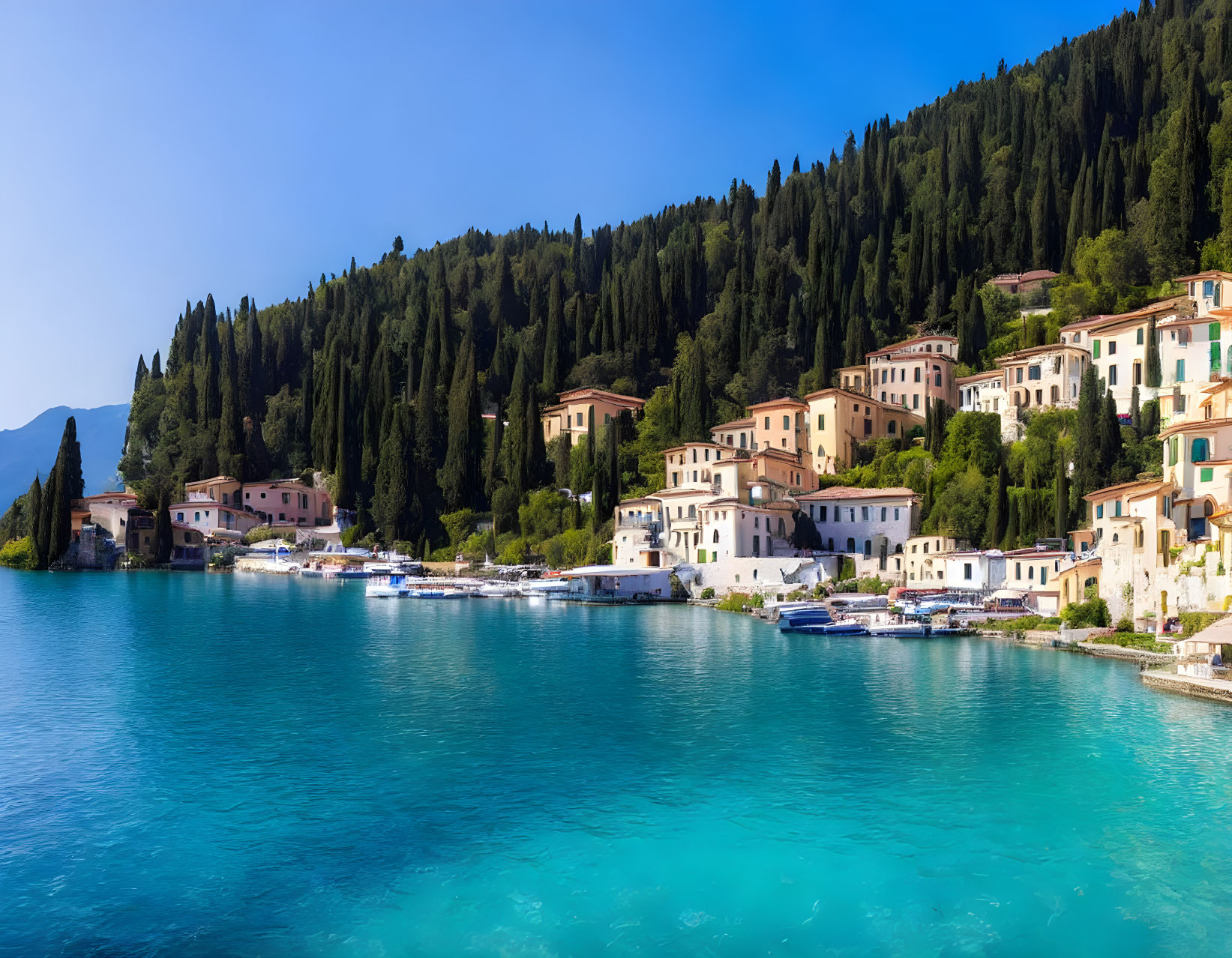 Scenic Lakeside Village with Colorful Buildings & Boats