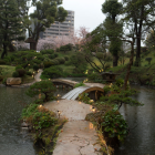 Tranquil Fantasy Garden with Pavilion, Trees, Flowers, Waterfalls, and Pond