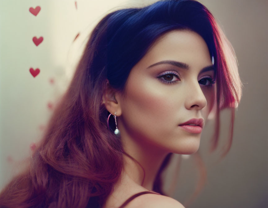 Woman with Blue and Pink Ombré Hair and Earrings Glancing Back with Heart Background